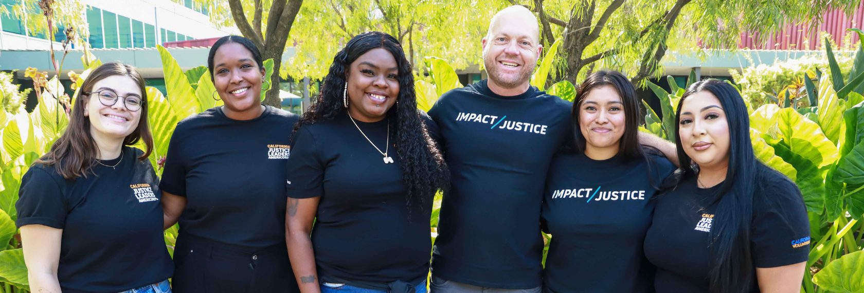 California Justice Leaders members and staff wearing Impact Justice and CJL tshirts.